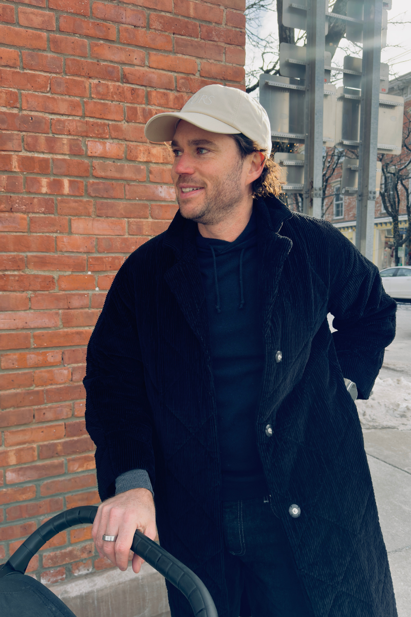 An OURS cap worn on a day out with the stroller